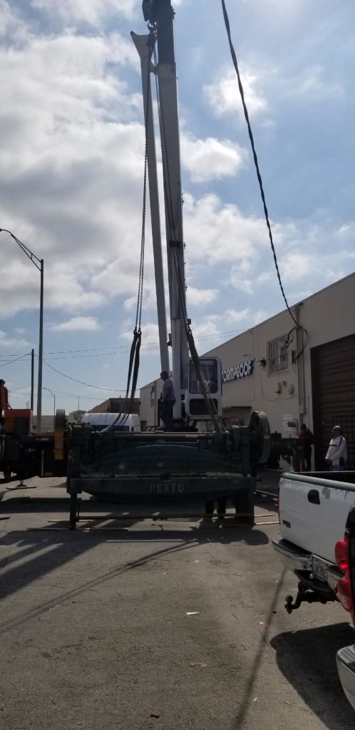 using crane for heavy machinery